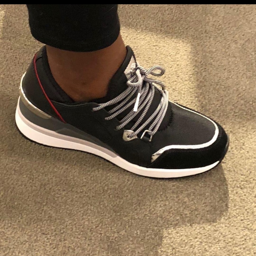 Michael Kors Liv Trainer 
Never worn. Size 6.5